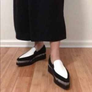 Black and white leather loafers